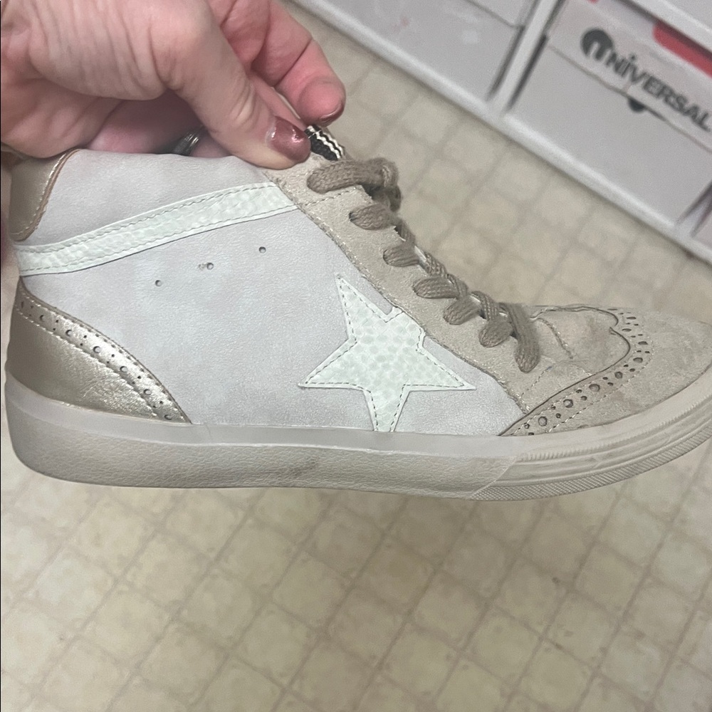 Shu shop boutique shoes. So cute!  Size 7.5. High tops. Brown and tan